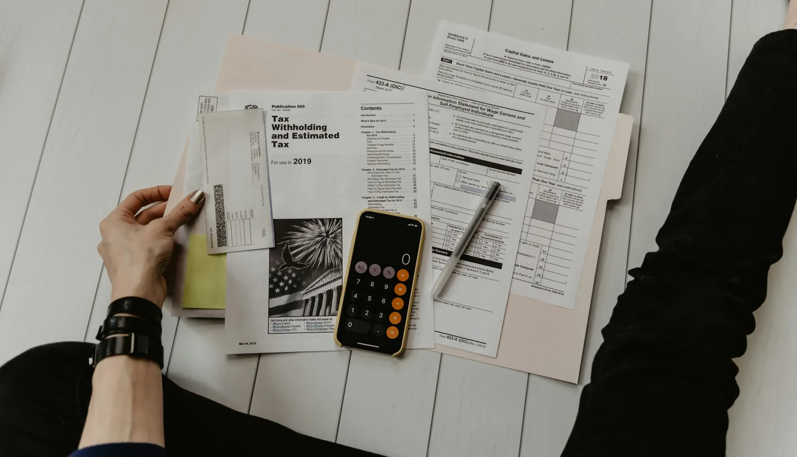 A person reading through an insurance policy document
