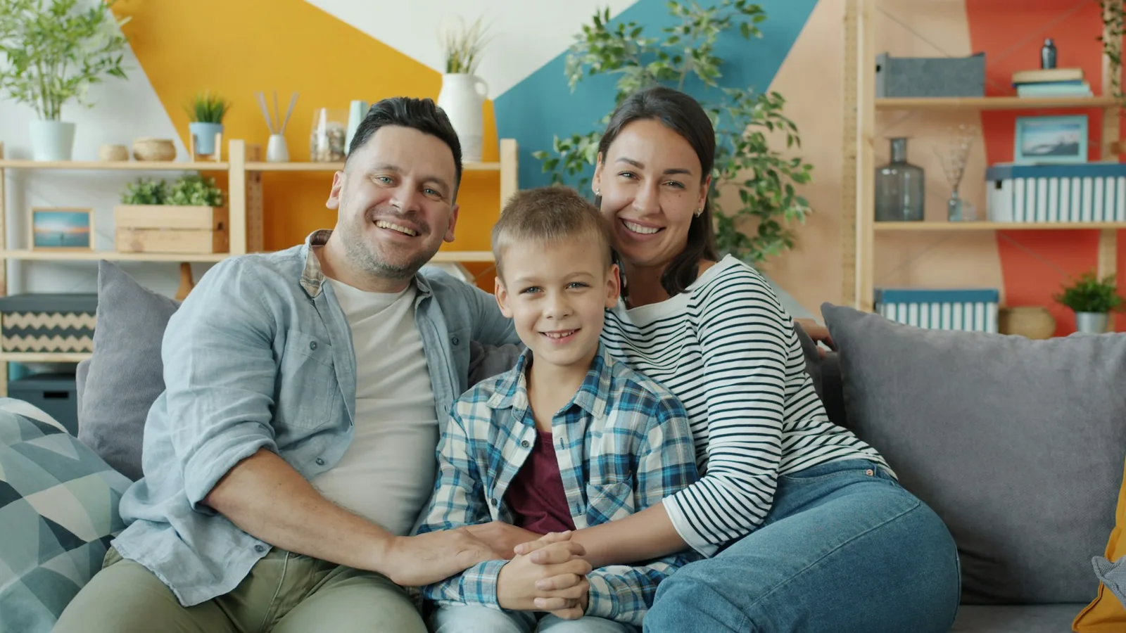 A family sitting together in a living room